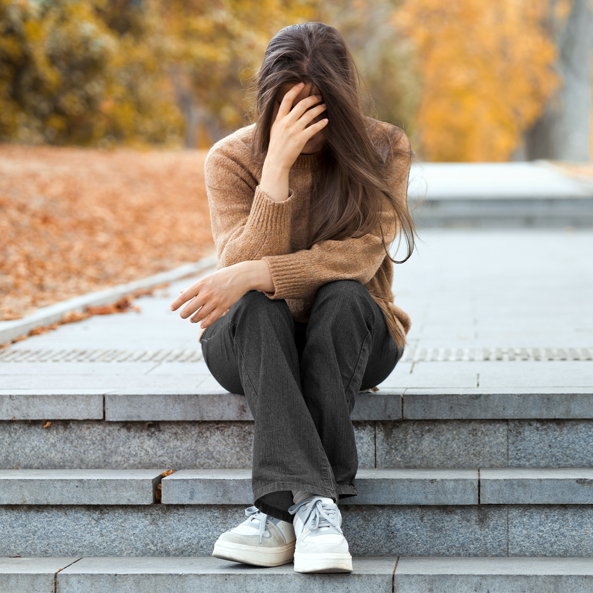 A woman expressing the emotional impact of infertility, seeking anxiety and depression support and coping strategies for mental wellness.